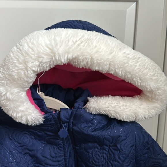Brand new textured blue winter coat with bows and fur lined hood. - Picture 4 of 4